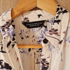 Chemise sans manche, à motifs fleuris