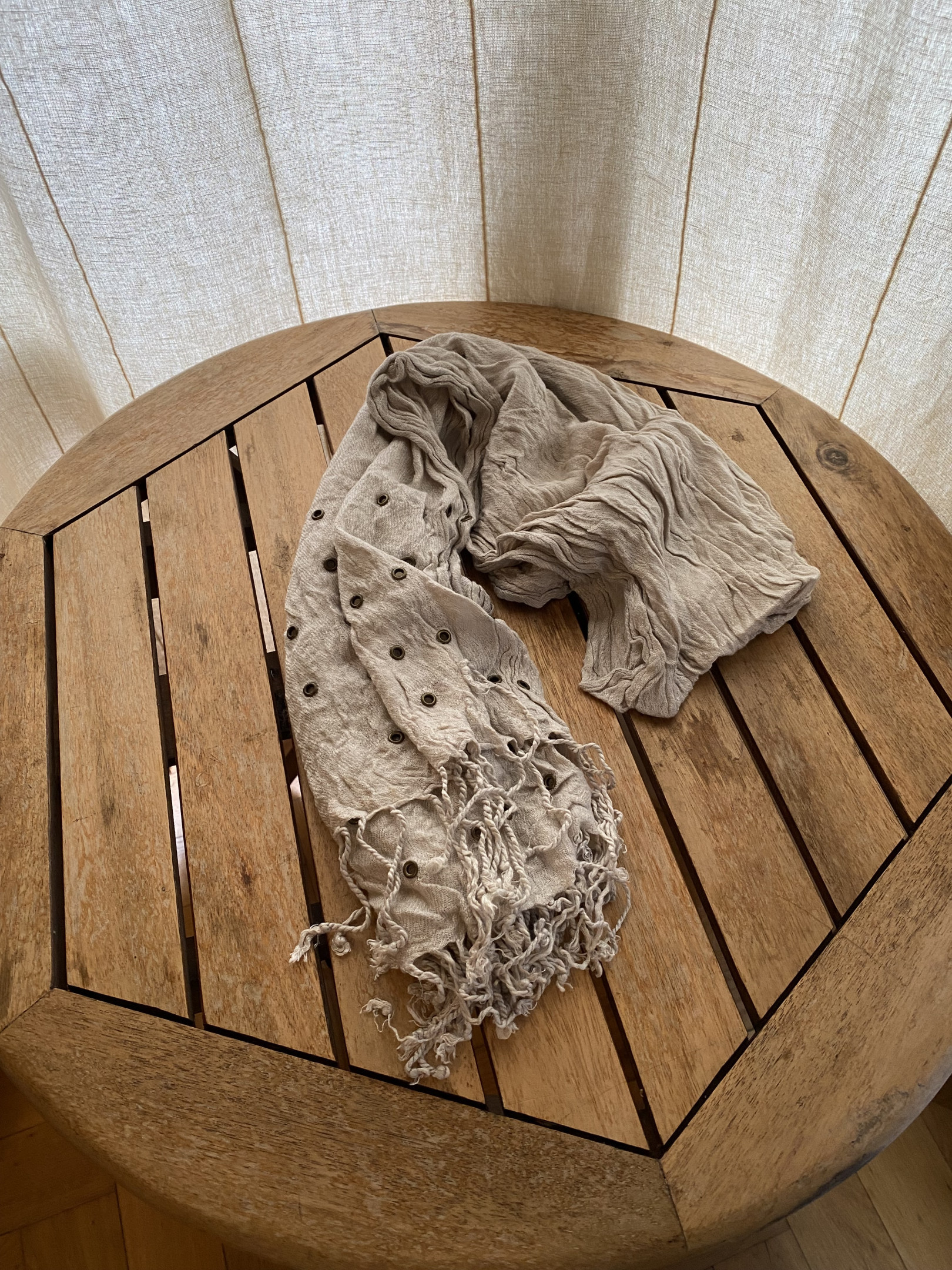Beige scarf with metallic details
