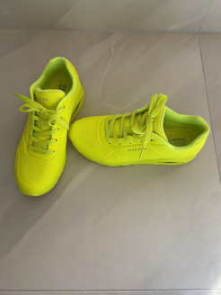 Fluorescent yellow trainers