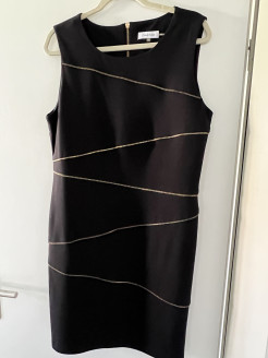 Black Calvin Klein dress with gold zip details