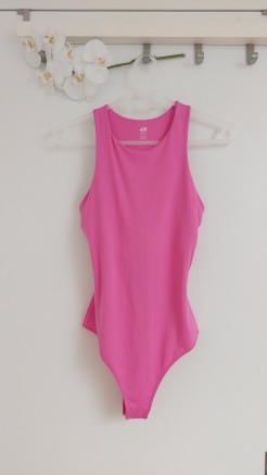 Pink sports bodysuit