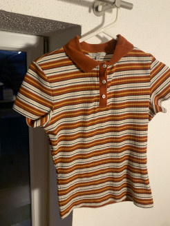 Orange and beige striped polo shirt