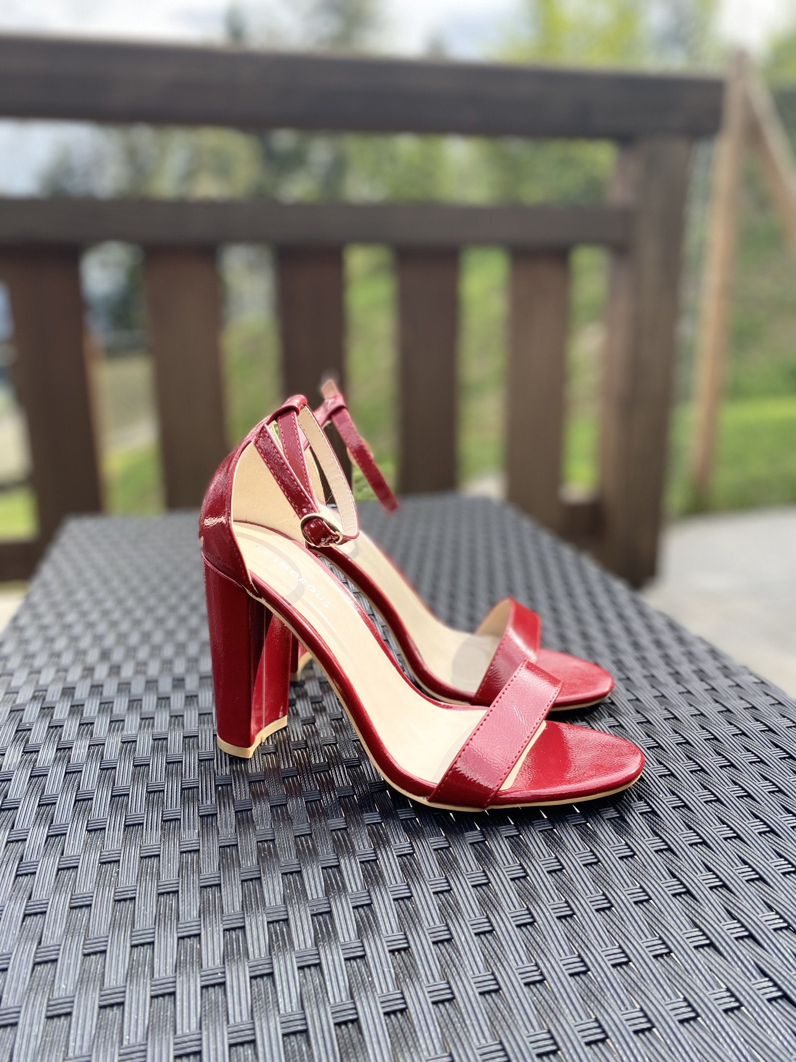 Red patent pumps
