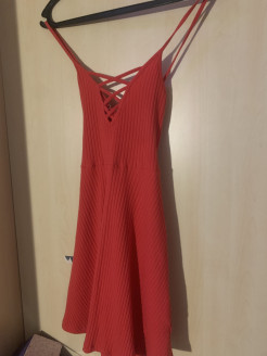 Mid-knee red dress, cross-over back with low neckline