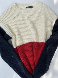 cream jumper with red stripes and blue sleeves