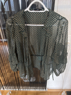 Green patterned blouse