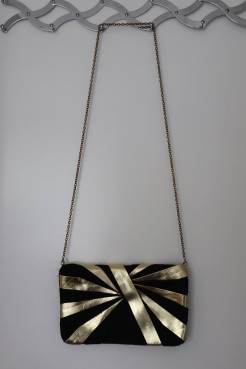 Black and gold clutch bag