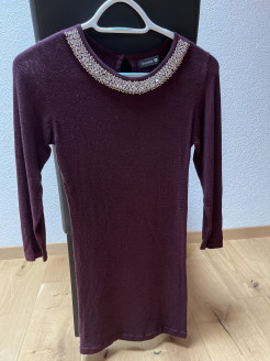 Wool dress with pearl necklace