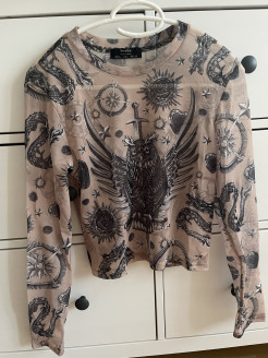 Blouse transparente avec motifs