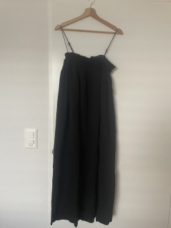 Mid-length, long black dress